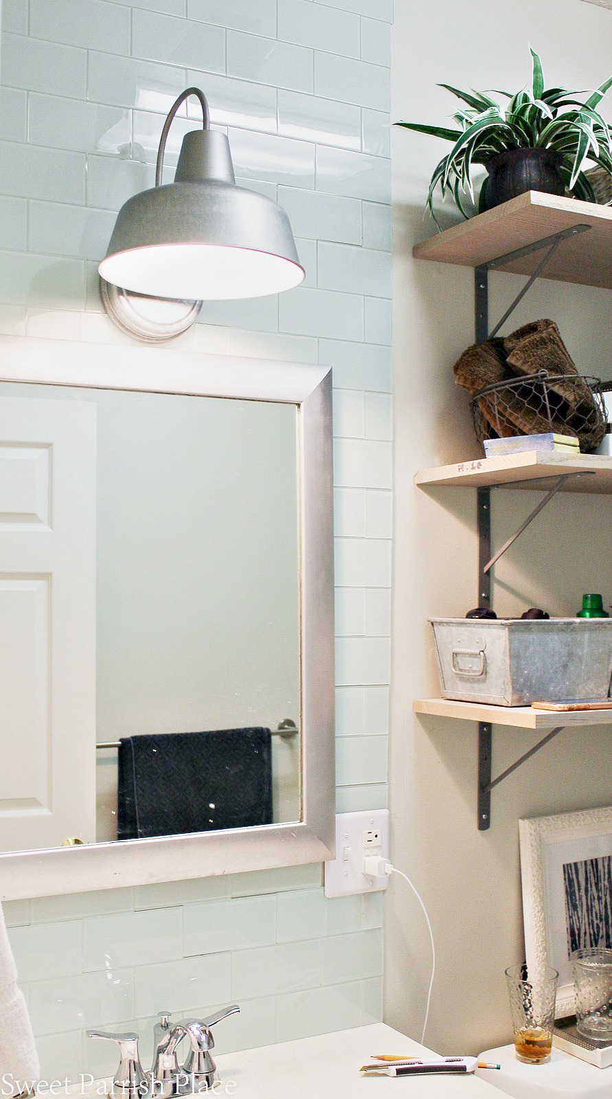 Subway tile backsplash and farmhouse light