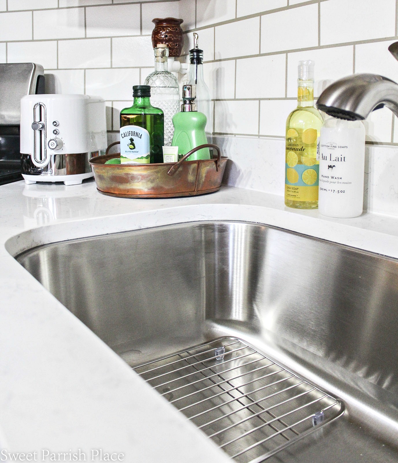 new quartz countertops with stainless steel sink