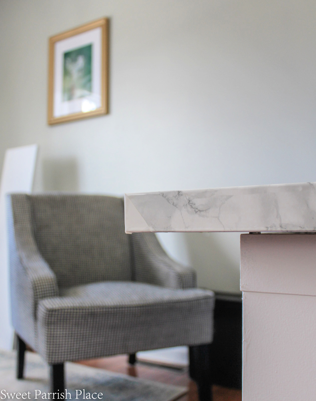 marble contact paper on Ikea desk- wrapped corners