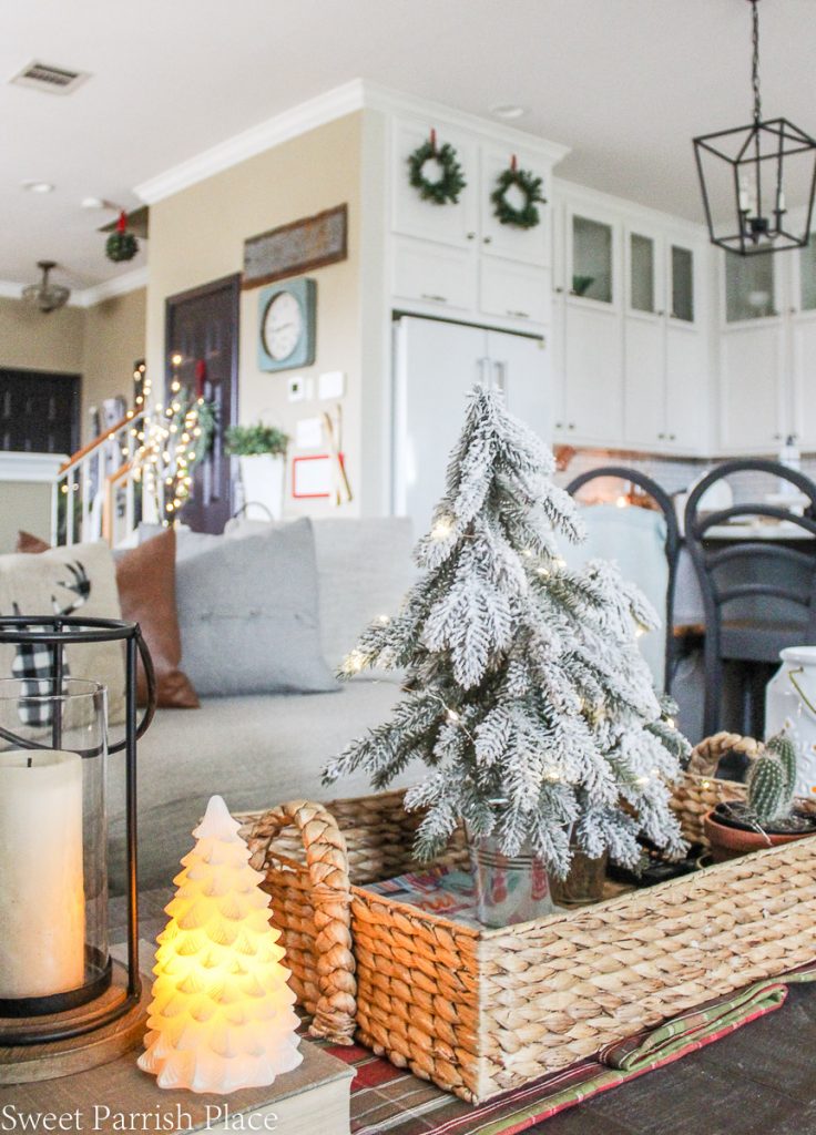 cozy and casual Christmas tour flocked tree on coffee table